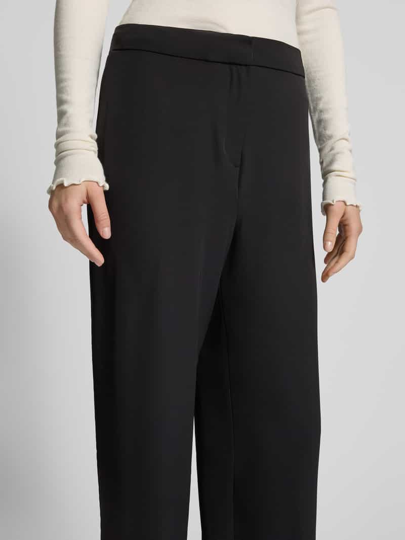 Review High waist stoffen broek met knoop haakjes- en ritssluiting