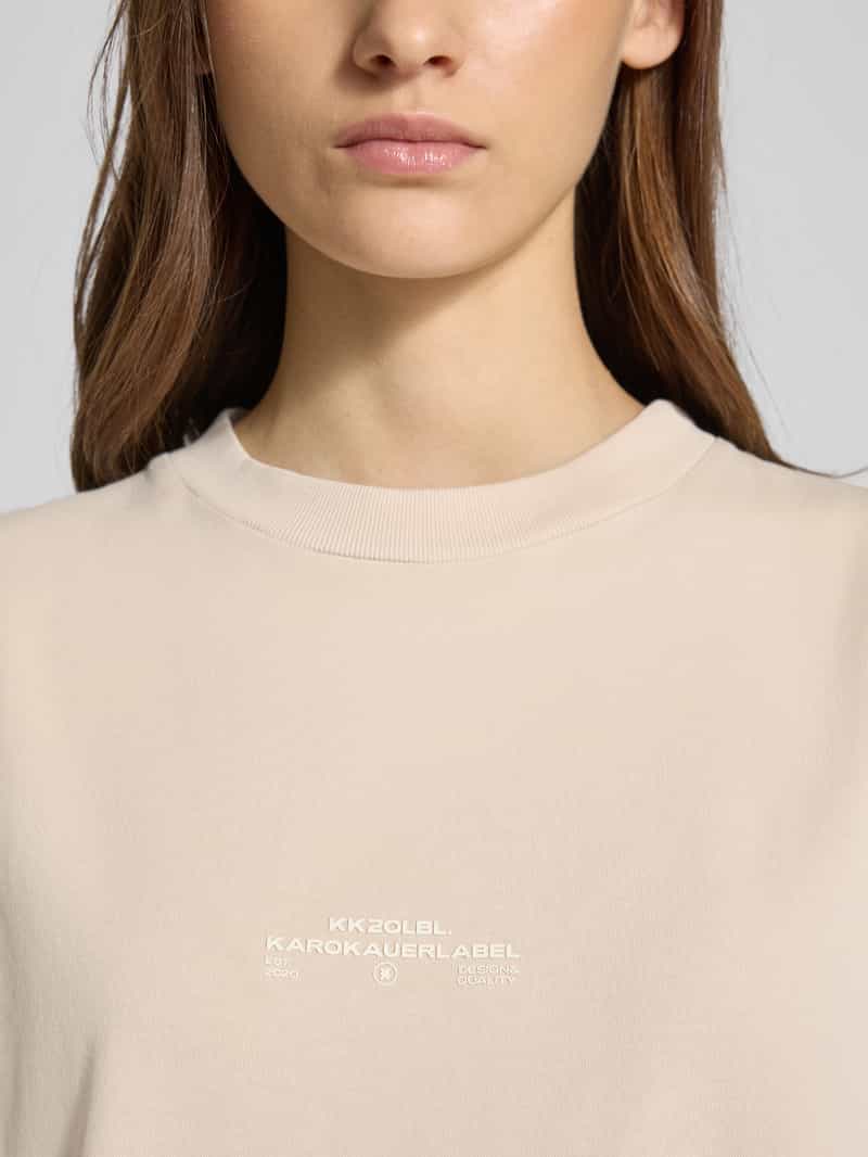 Karo Kauer Oversized tanktop met labelprint
