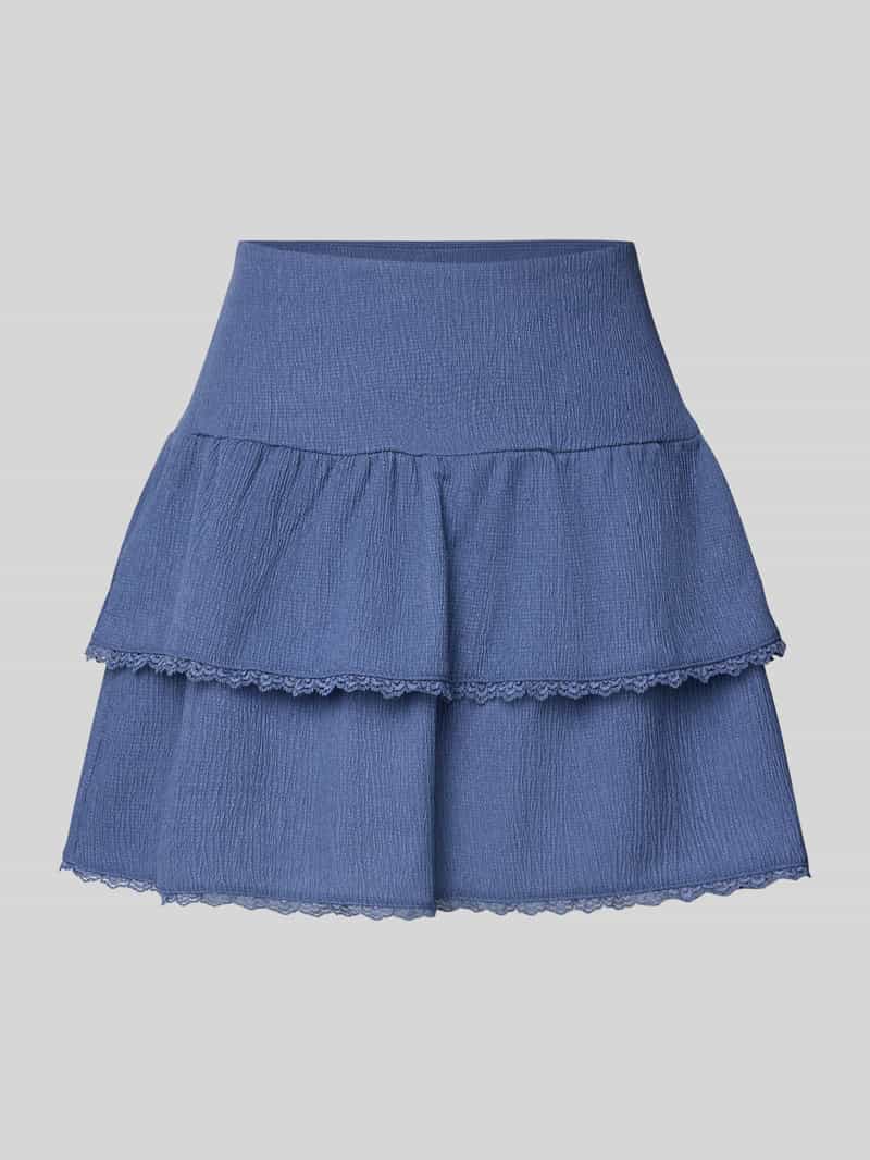 Review Minirok in laagjeslook met kant