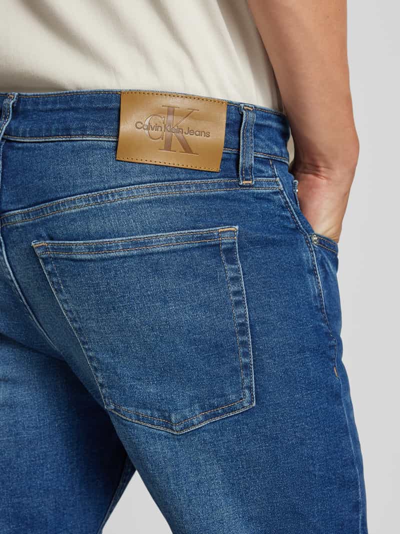 Calvin Klein Jeans Slim tapered fit jeans met labelpatch