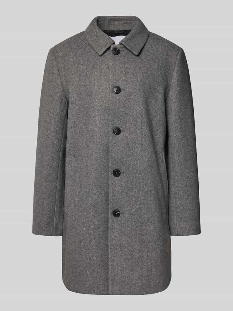 REVIEW Lange jas met steekzakken