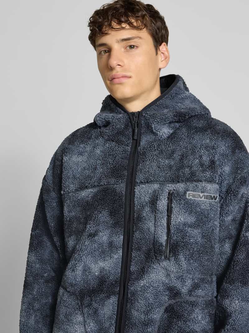 REVIEW Fleecejack met ritszak en labeldetail