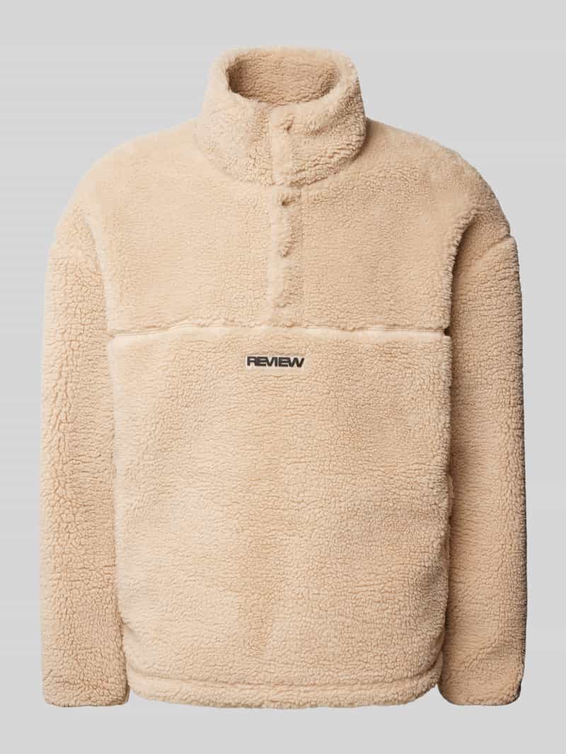 REVIEW Sherpa jacket met labelpatch