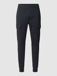 Spodnie dresowe z nadrukiem z logo od EA7 Emporio Armani Niebieski - 17