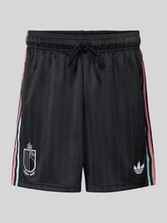 Spodnie dresowe o kroju regular fit z detalem z logo model 'Belgien 26' od adidas Originals - 39