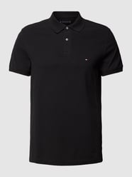 Poloshirt mit Label-Detail von Tommy Hilfiger Schwarz - 43