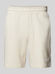 Regular Fit Sweatshorts mit Label-Print von PUMA PERFORMANCE Beige - 26