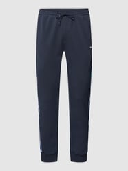 Sweatpants mit Galonstreifen Modell 'Hurley' von BOSS Green Blau - 21