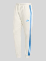 Spodnie dresowe z detal z logo z mieszanka bawełny od adidas Sportswear - 46