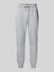 Spodnie dresowe o kroju slim fit z zaznaczonym rozporkiem od Tommy Jeans - 34