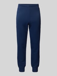 Slim Fit Sweatpants mit Label-Stitching von adidas Originals Blau - 25