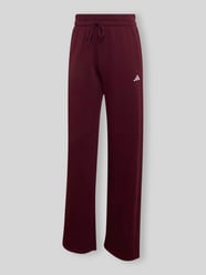 Spodnie dresowe o kroju regular fit z mieszanki bawełny model 'W SL FC PT' od adidas Sportswear - 18