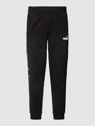 Sweatpants mit Label-Detail Modell 'ESS+ Tape Sweatpants' von PUMA PERFORMANCE - 42