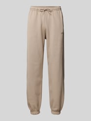 Relaxed Fit Sweatpants mit Label-Print Modell 'EMIS' von Guess Activewear Beige - 8