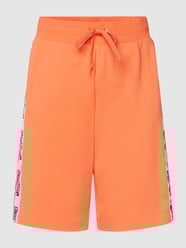 Sweatshorts met galonstrepen van Moschino Swim + Underwear Oranje - 30