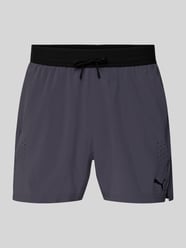 Szorty w kroju regular fit z nadrukiem logo od PUMA Performance - 47