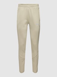 Sweatpants mit Reißverschlusstaschen Modell 'Evostripe Pants' von PUMA PERFORMANCE Beige - 16