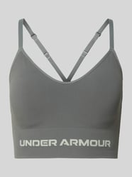 Biustonosz sportowy o kroju slim fit z nadrukiem z logo Model 'Vanish' od Under Armour - 3