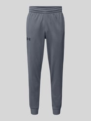 Spodnie dresowe z elastycznym ściągaczem od Under Armour - 33