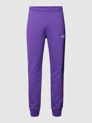 Spodnie dresowe z wyhaftowanym logo od Nike Fioletowy - 8