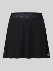 Rozkloszowana sportowa spódnica z detal z logo od Lacoste Sport - 36