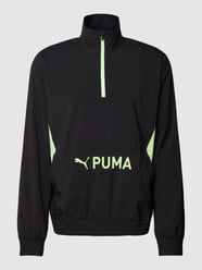 Sweatshirt mit kurzem Reißverschluss Modell 'Woven' von PUMA PERFORMANCE Schwarz - 40