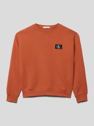 Sweatshirt met labelapplicatie, model 'OTTO' van Calvin Klein Jeans Oranje - 8