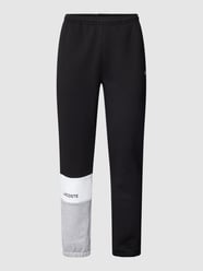Spodnie dresowe w stylu Colour Blocking od Lacoste Czarny - 17