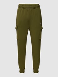 Spodnie dresowe z wyhaftowanym logo model ‘Nsw Club Pant Cargo’ od Nike Zielony - 28