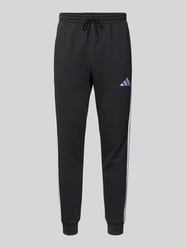 Regular Fit Sweatpants mit Label-Stitching von adidas Sportswear - 9