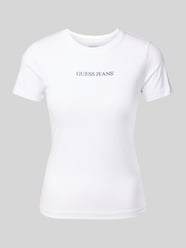 T-shirt o kroju slim fit z nadrukiem z logo od Guess Jeans - 18