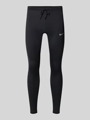 Tight Fit Sport-Leggings mit Logo-Print von Nike Training - 43