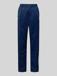Spodnie typu track pants o kroju straight fit z lampasami model ‘Break’ od adidas Originals - 36