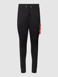 Slim Fit Sweatpants mit Cargotaschen von Alpha Industries Schwarz - 36