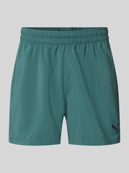 Szorty sportowe o kroju regular fit z nadrukiem z logo model „TAD ESSENTIALS” od PUMA Performance - 2