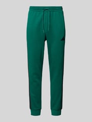 spodnie dresowe z elastycznym pasem od adidas Sportswear - 36