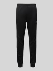 Regular Fit Trainingshose mit Label-Stitching von adidas Originals - 23