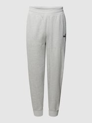 PLUS SIZE Sweatpants mit Label-Detail von PUMA Performance Plus Grau - 35