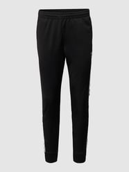 Slim Fit Sweatpants mit Logo-Streifen von adidas Originals - 40