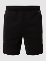 Regular Fit Sweatshorts mit Logo-Streifen von Lacoste - 8