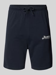 Spodnie dresowe o kroju slim fit z nadrukiem z logo model ‘GORDON’ od Jack & Jones - 12