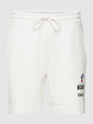 Sweatshorts mit Peanuts®-Stitching Modell 'Soley' von BOSS Weiß - 34