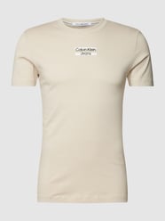 T-shirt z nadrukiem z logo od Calvin Klein Jeans Beżowy - 26