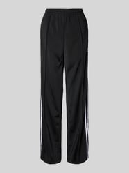 Flared Sweatpants mit fixierten Bügelfalten Modell 'FIREBIRD' von adidas Originals Schwarz - 42