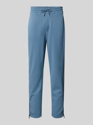 Spodnie dresowe o kroju relaxed fit z lampasami Model 'DOLOS' od HUGO - 13