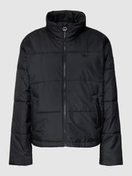 Steppjacke mit Kontraststreifen von adidas Originals Schwarz - 38