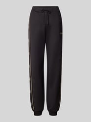 spodnie dresowe z detalem z logo model 'OCTAVIA' od GUESS Activewear - 2