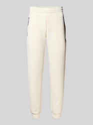 Relaxed fit sweatpants met logo-applicatie, model 'Train' van EA7 Emporio Armani - 10