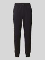 Spodnie dresowe o kroju regular fit z tunelem model ‘Train’ od EA7 Emporio Armani - 27