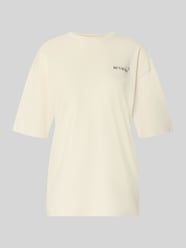 T-shirt o kroju oversize z nadrukiem kwiatów na plecach od REVIEW - 4